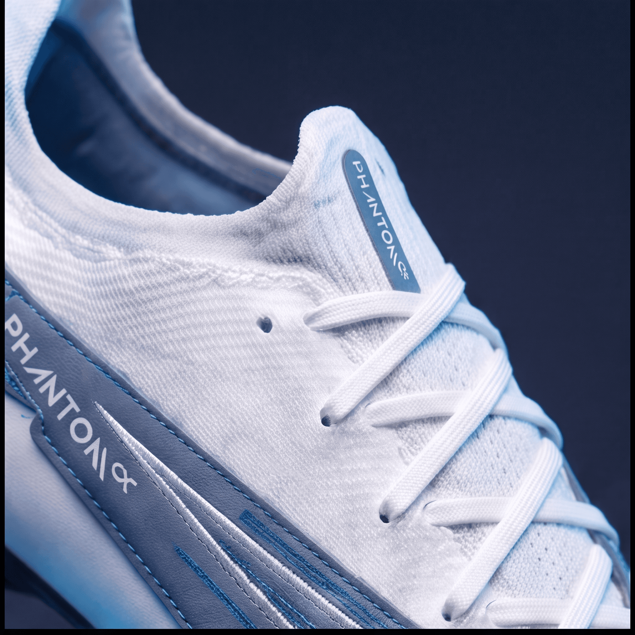 Close view of the knitted upper and lacing